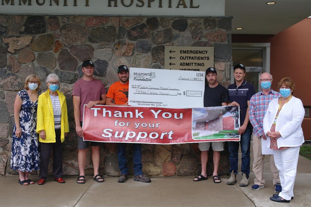 Cheque presentation in front of the Seaforth Community Hospital 